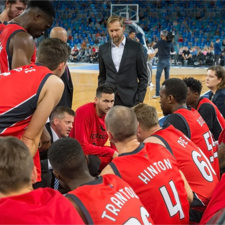 Coach motiviert sein Team – mentale Stärke und Führung im Sport